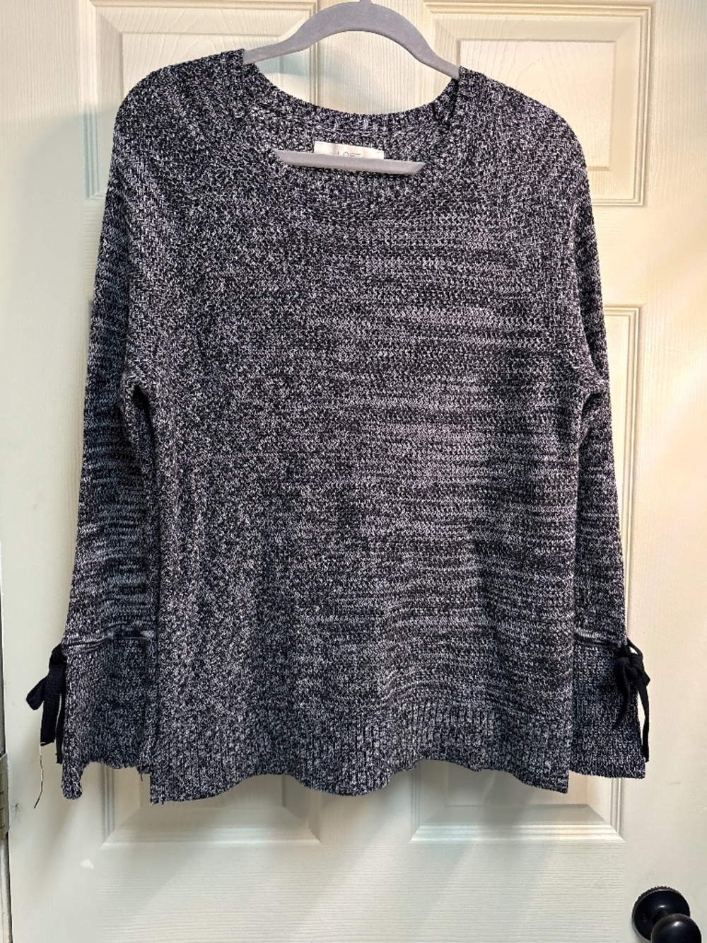 Loft black and white sweater bow accents
